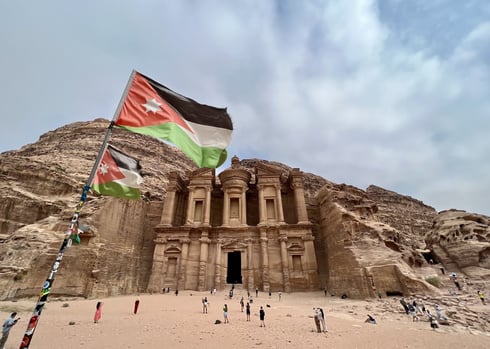 Petra-Monastery-and-Jordan-Flag-CREDIT-Jennifer-Bain